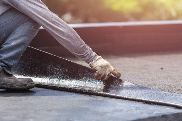 Professional Basement Waterproofing technician working in Grady, AL